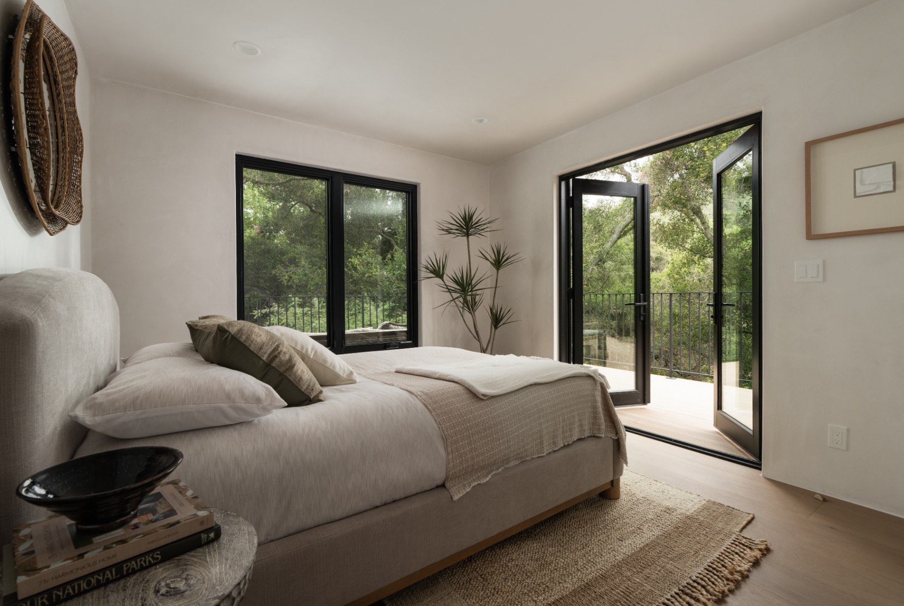 Bedroom opening to a private balcony