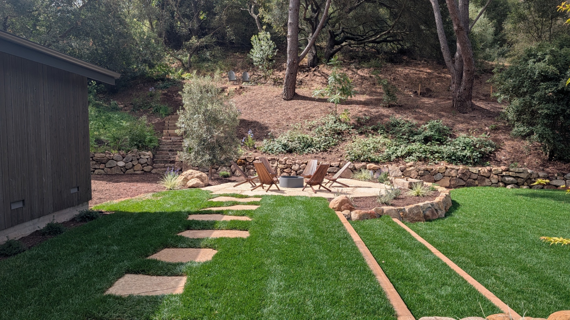 Stone fire-pit terrace at the garden